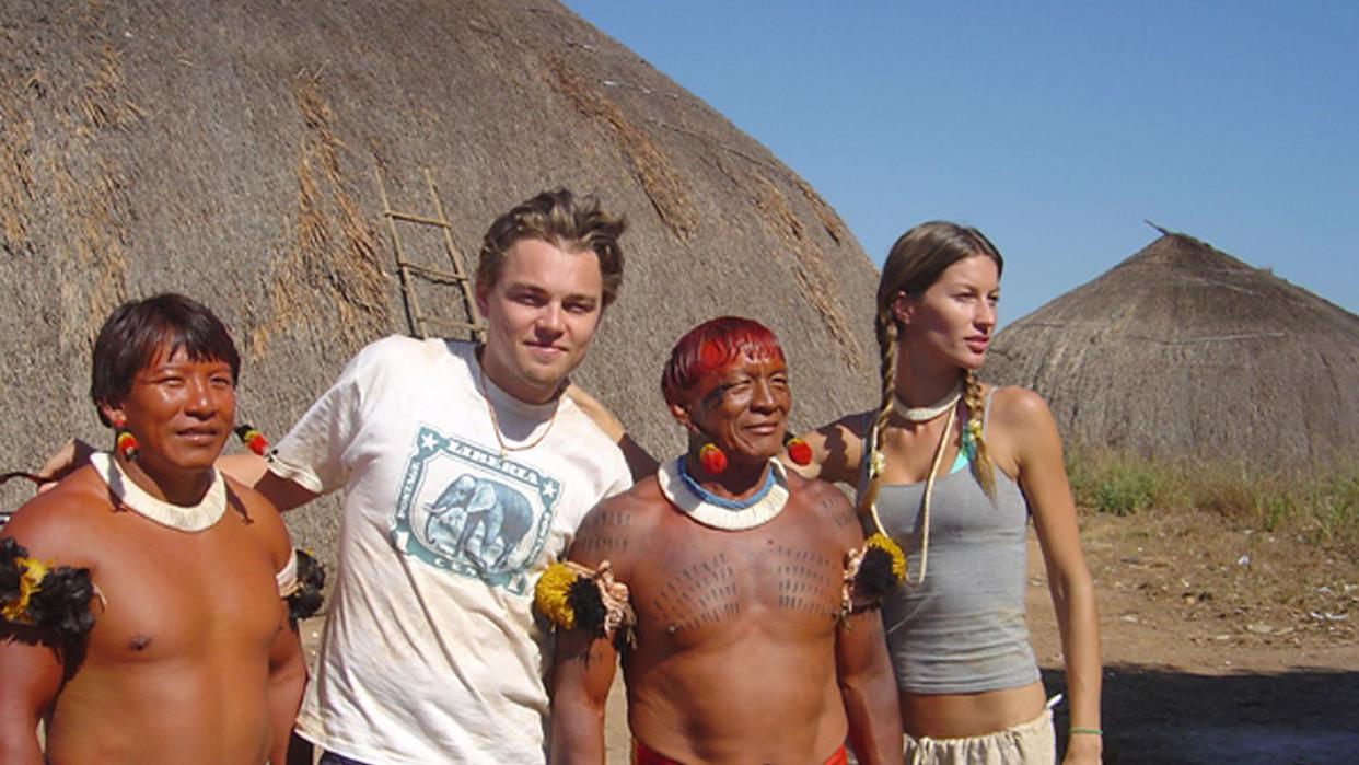 Gisele Bundchen and Leonardo DiCaprio with Xingu Indians in the Amazon Rainforest