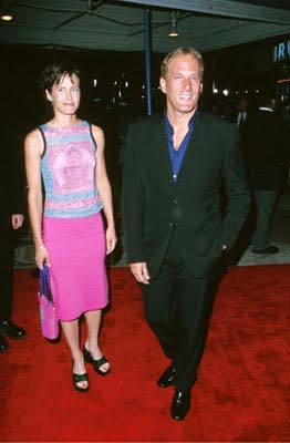 Michael Bolton and Woman with Pink Skirt at the Mann's Village Theatre premiere of Warner Brothers' Space Cowboys