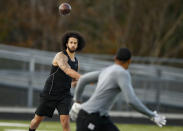 FILE - In this Saturday, Nov. 16, 2019, file photo, free agent quarterback Colin Kaepernick participates in a workout for NFL football scouts and media, in Riverdale, Ga. (AP Photo/Todd Kirkland, File)
