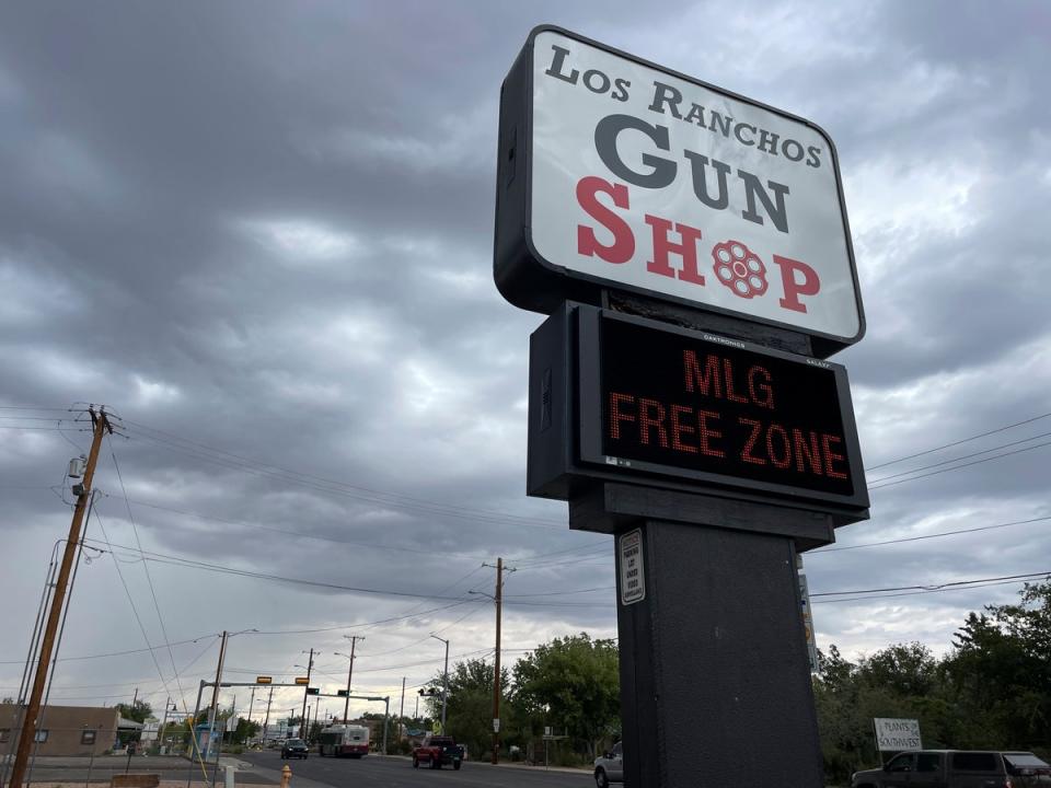 The marquee at a gun shop in Los Ranchos, New Mexico on 11 September protests Governor Michelle Lujan Grisham’s order banning residents from carrying firearms in public. (AP)