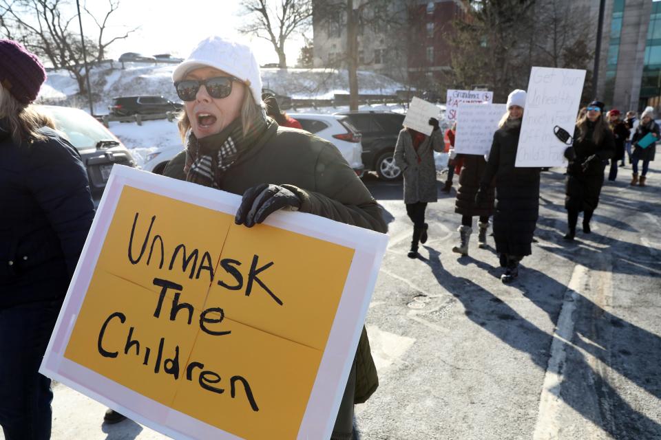 Parents and supporters protest the mask mandate for students as they march around the Rockland County Office Building Jan. 31, 2022 in New City. 