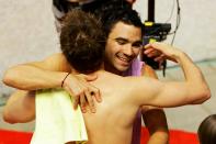 DELHI, INDIA - OCTOBER 11: Alexandre Despatie (R) of Canada celebrates teammate Eric Sehn after winning the gold medal in the Men's 3m Springboard Final at Dr. S.P. Mukherjee Aquatics Complex during day eight of the Delhi 2010 Commonwealth Games on October 11, 2010 in Delhi, India. (Photo by Matt King/Getty Images)