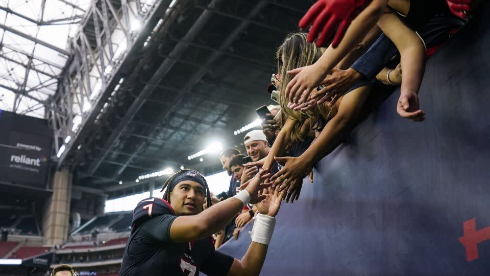 Stroud celebrates with fans after the Texans beat the Buccaneers. - Eric Christian Smith/AP