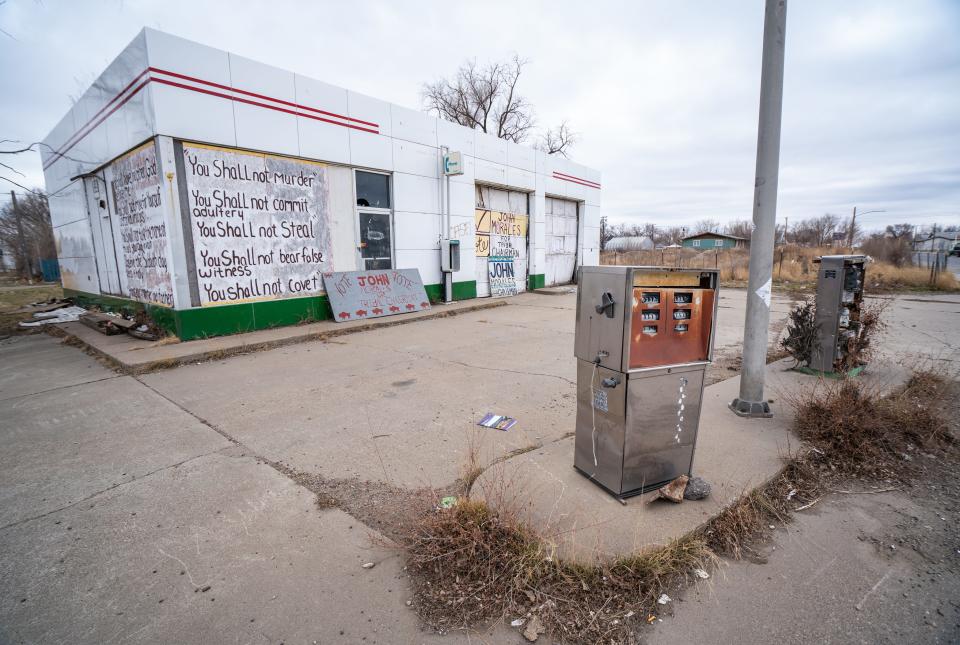 An abandoned gas station is one of the businesses that have shuttered in recent years along U.S. Highway 2, which bisects the rural community of Poplar in northeast Montana.