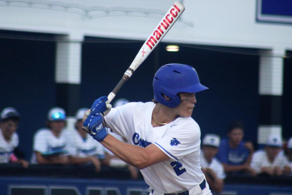 Trinity Christian's Brady Harris (2) prepares to swing during an FHSAA Class 3A high school baseball first-round playoff against Bolles.