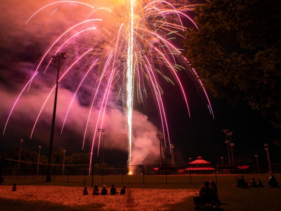 The crowd watches in awe as fireworks light up the night during the City of Loudon Independence Day Celebration at Loudon Municipal Park in Loudon, Tenn. on Sunday, July 3, 2022. 