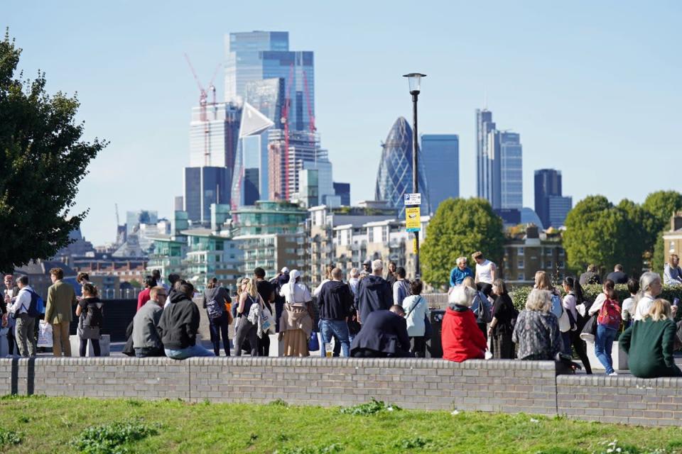 Members of the public in the queue next to the River Thames near Bermondsey, London, as they wait to view the Queen lying in state ahead of her funeral on Monday (James Manning/PA) (PA Wire)