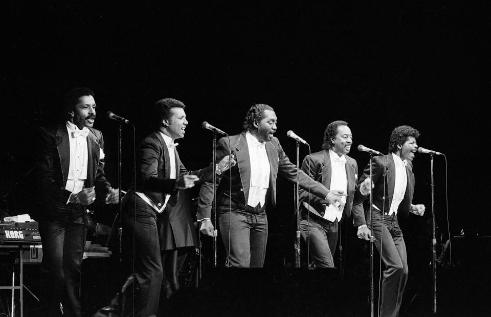 The Temptations are singing one of their Motown hits for 4,400 soul music fans that packed the Grand Ole Opry House Feb. 23, 1986. They share the stage with the Four Tops as part of the "Tempts and Tops" tour.