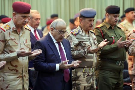 Iraqi Prime Minister Adel Abdul Mahdi attends the celebration ceremony of the first anniversary of defeating Islamic state in Baghdad, Iraq, December 10, 2018. Iraqi Prime Minister Media Office/Handout via REUTERS