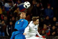 Soccer Football - International Friendly - Russia vs Brazil - Luzhniki Stadium, Moscow, Russia - March 23, 2018 Brazil’s Casemiro in action with Russia’s Aleksei Miranchuk REUTERS/Sergei Karpukhin