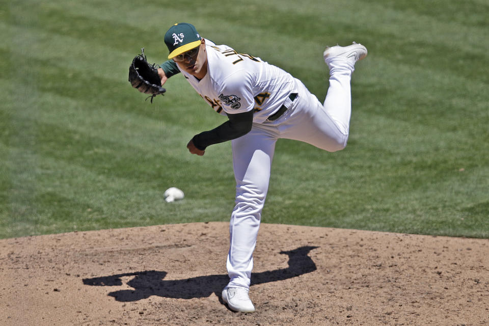 Oakland Athletics pitcher Jesus Luzardo works against the Colorado Rockies in the sixth inning of a baseball game Wednesday, July 29, 2020, in Oakland, Calif. (AP Photo/Ben Margot)