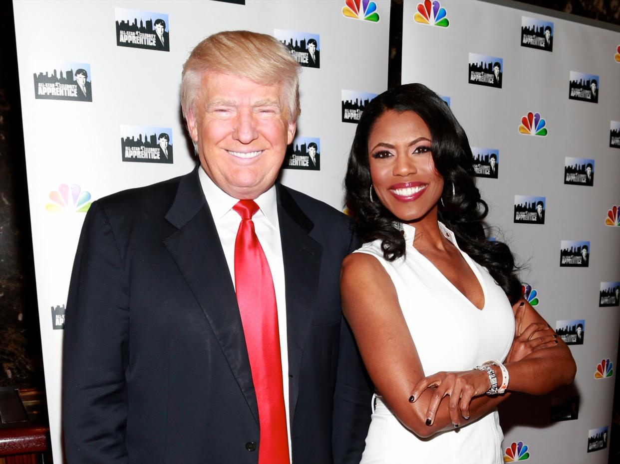 President Trump called Omarosa Manigault Newman (pictured with him in 2013) a “dog” on Twitter. (Photo: Charles Eshelman/FilmMagic)