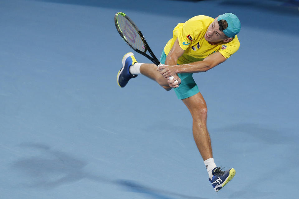 Alex de Minaur of Australia plays a shot against Rafael Nadal of Spain during their ATP Cup tennis match in Sydney, Saturday, Jan. 11, 2020. (AP Photo/Steve Christo)