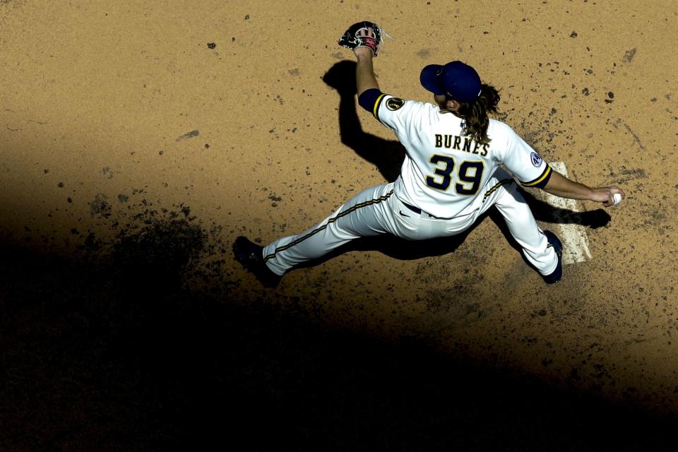 Milwaukee Brewers starting pitcher Corbin Burnes throws during the fifth inning of a baseball game against the St. Louis Cardinals Thursday, May 13, 2021, in Milwaukee. (AP Photo/Morry Gash)