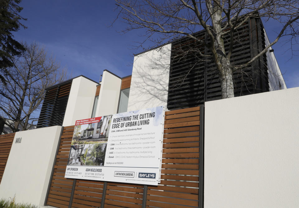 FILE - In this Aug. 13, 2018, file photo, a house is pictured for sale in Christchurch, New Zealand. New Zealand's government on Thursday, Feb. 25, 2021 made the first of several promised moves to rein in skyrocketing house prices by ordering the nation's Reserve Bank to consider the impact on housing when making decisions. (AP Photo/Mark Baker, File)