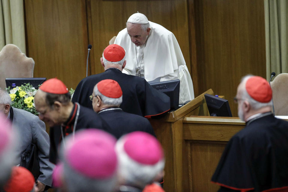 Pope Francis arrives at the opening of the second day of a Vatican's conference on dealing with sex abuse by priests, at the Vatican, Friday, Feb. 22, 2019. Pope Francis has issued 21 proposals to stem the clergy sex abuse around the world, calling for specific protocols to handle accusations against bishops and for lay experts to be involved in abuse investigations. (Giuseppe Lami/Pool Photo via AP)