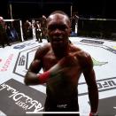 <p>A familiar face to fervent UFC fans, Adesanya — "the last stylebender" — has quickly risen to prominence following his remarkable bout against Paulo Costa in September 2020, winning by TKO in the second round. The five-time Performance of the Night winner is considered to be one of the best strikers in MMA. “Adesanya, if he’s able to keep this fight standing, which he has proven time and time again that he’s able to do, is a problem for not only Jon Jones, but all the way up to heavyweight with Stipe Miocic.," said Daniel Cormier of Adesanya. We're not here to disagree.</p><p><a href="https://www.instagram.com/p/CFy9IR6nB-k/" rel="nofollow noopener" target="_blank" data-ylk="slk:See the original post on Instagram;elm:context_link;itc:0;sec:content-canvas" class="link ">See the original post on Instagram</a></p>