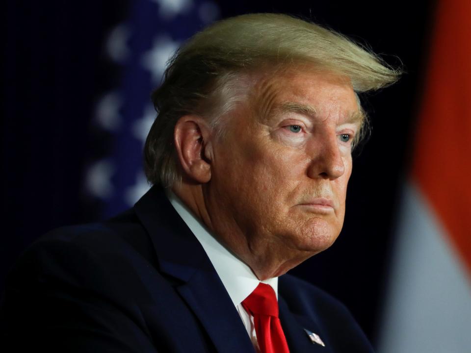 FILE PHOTO: U.S. President Donald Trump looks on during a news conference in New Delhi, India, February 25, 2020. REUTERS/Al Drago