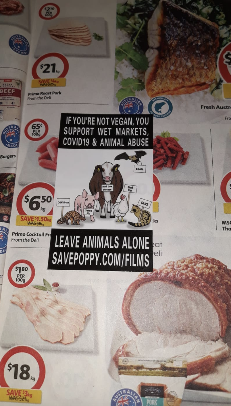 Photo of vegan sticker inside a Coles catalogue.