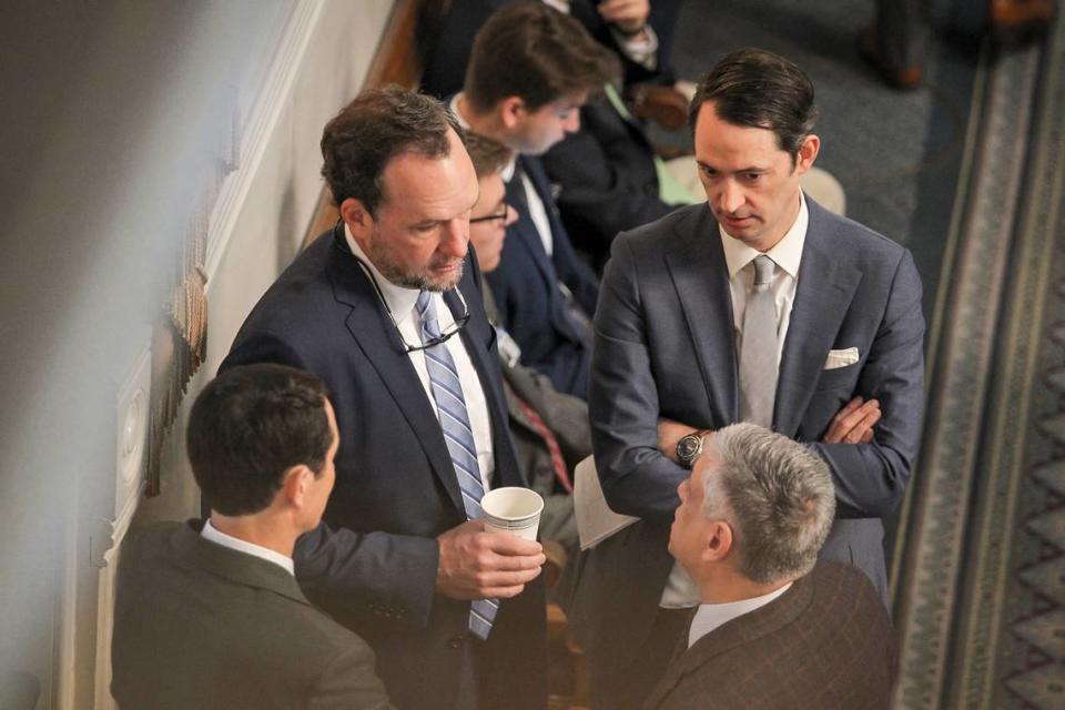 Rep. Bruce Bannister, left, and Daniel Boan during a House session on Tuesday, March 14, 2023. (Travis Bell/STATEHOUSE CAROLINA)