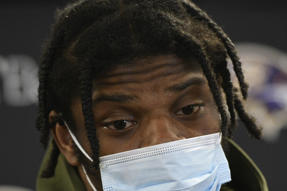 Baltimore Ravens quarterback Lamar Jackson (8) takes questions during a new conference after an NFL football game against the Pittsburgh Steelers, Sunday, Dec. 5, 2021, in Pittsburgh. (AP Photo/Don Wright)