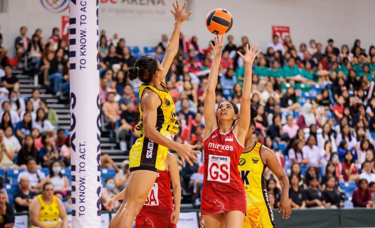 Singapore goal shooter Amandeep Chahal shoots over her Papua New Guinea defender in the final of the 2023 Mirxes Nations Cup. (PHOTO: Mirxes Nations Cup)