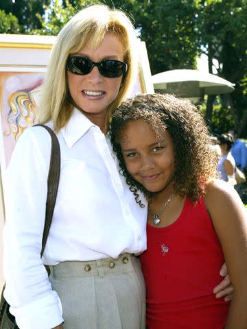 <p>Frazer Harrison/Getty</p> Donna Mills with daughter Chloe Mills at the 9th annual "Safari Brunch" to benefit the Wildlife Waystation on October 18, 2003 in Bel Air, California.