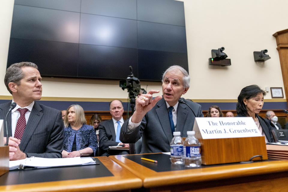 Federal Deposit Insurance Corporation Board of Directors Chairman Martin Gruenberg, center, accompanied by Federal Reserve Board of Governors Vice Chair for Supervision Michael Barr, left, and Treasury Department Under Secretary for Domestic Finance Nellie Liang, right, testifies at a House Financial Services Committee hearing on recent bank failures, on Capitol Hill, Wednesday, March 29, 2023, in Washington. (AP Photo/Andrew Harnik)