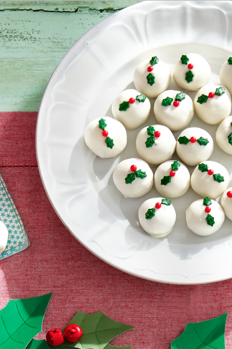 <p>Only three steps are needed to make these rich truffles filled with Speculoos cookies; the fourth step is eating them!</p><p><strong><a href="https://www.countryliving.com/food-drinks/a29640166/white-chocolate-truffles-recipe/" rel="nofollow noopener" target="_blank" data-ylk="slk:Get the recipe;elm:context_link;itc:0;sec:content-canvas" class="link ">Get the recipe</a>.</strong></p><p><a class="link " href="https://www.amazon.com/WILTON-PRODUCTS-Sprinkles-Mix-Christmas-Holly/dp/B07J6RYYHV/?tag=syn-yahoo-20&ascsubtag=%5Bartid%7C10050.g.34470406%5Bsrc%7Cyahoo-us" rel="nofollow noopener" target="_blank" data-ylk="slk:SHOP HOLLY SPRINKLES;elm:context_link;itc:0;sec:content-canvas">SHOP HOLLY SPRINKLES</a></p>