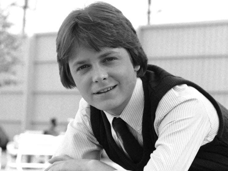 black and white photo of actor Michael J. Fox in 1983