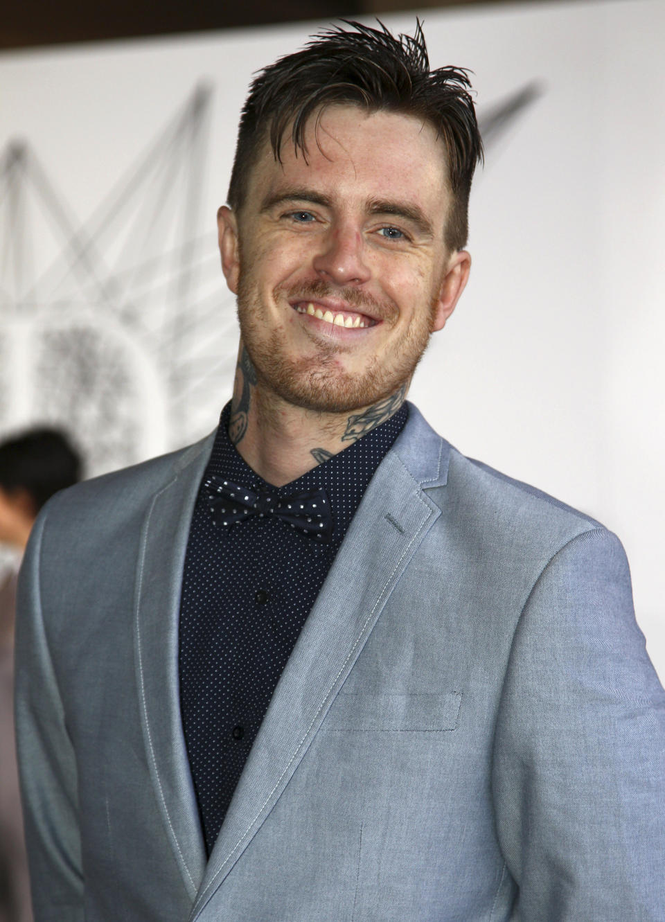 Matt Colwell, better known by his stage name 360, arrives for the Australian music industry Aria Awards in Sydney, Thursday, Nov. 29, 2012. (AP Photo/Rick Rycroft)