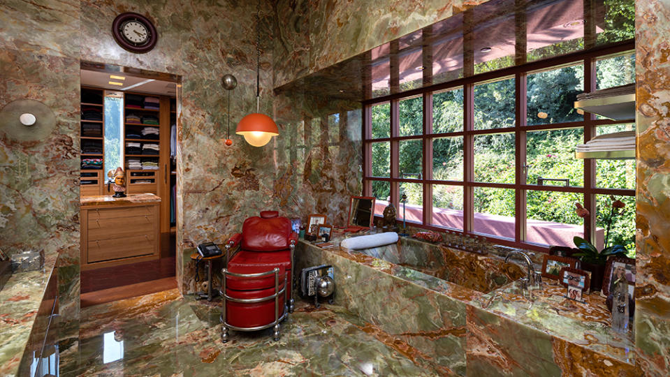 A marble-tiled bathroom - Credit: Tyler Hogan