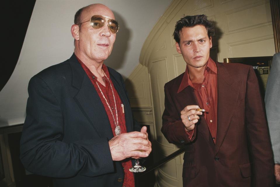 Hunter S. Thompson standing next to Johnny Depp