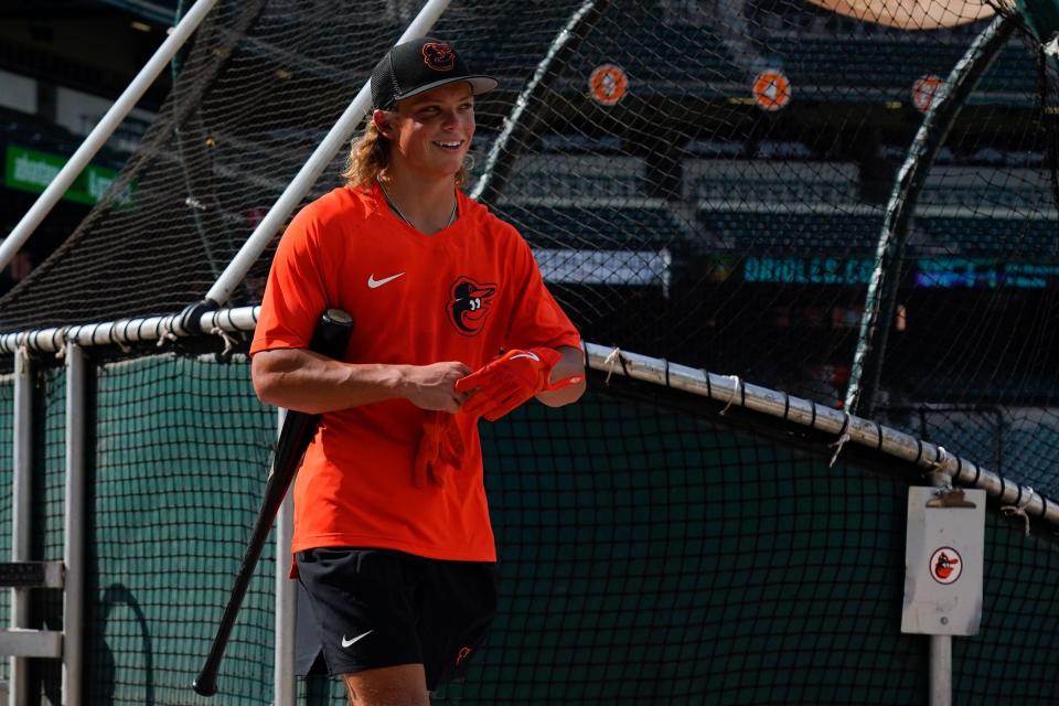 Jul 27, 2022; Baltimore, Maryland, USA; Baltimore Orioles number one draft pick Jackson Holliday walks on the field during the batting practice before the game against the Tampa Bay Rays at Oriole Park at Camden Yards. Holliday was the number one over draft pick in the 2022 MLB Draft. Mandatory Credit: Tommy Gilligan-USA TODAY Sports