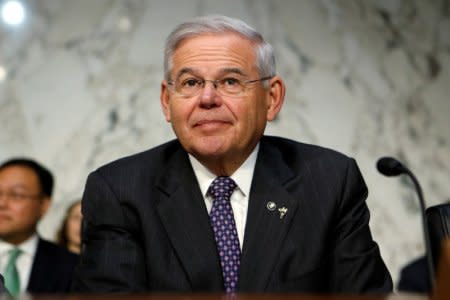 FILE PHOTO: Senator Robert Menendez (D-NJ) waits to question Jerome Powell on his nomination to become chairman of the U.S. Federal Reserve during a hearing before the Senate Banking, Housing and Urban Affairs Committee in Washington, U.S., November 28, 2017.   REUTERS/Joshua Roberts