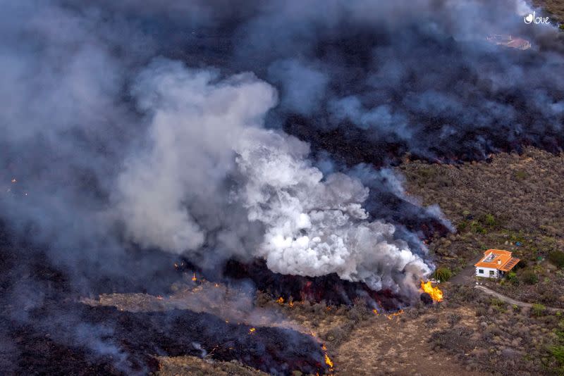 Drone view of home spared from volcanic lava on La Palma