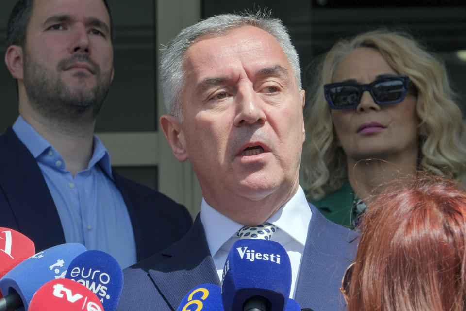 Pro-Western incumbent Milo Djukanovic addresses the media after voting at a polling station in Montenegro's capital Podgorica, Sunday, April 2, 2023. Montenegrins are casting ballots on Sunday in a runoff presidential election that is a battle between a long-serving pro-Western incumbent and a newcomer promising changes in the small NATO member state in Europe that has been locked in political turmoil. (AP Photo/Risto Bozovic)