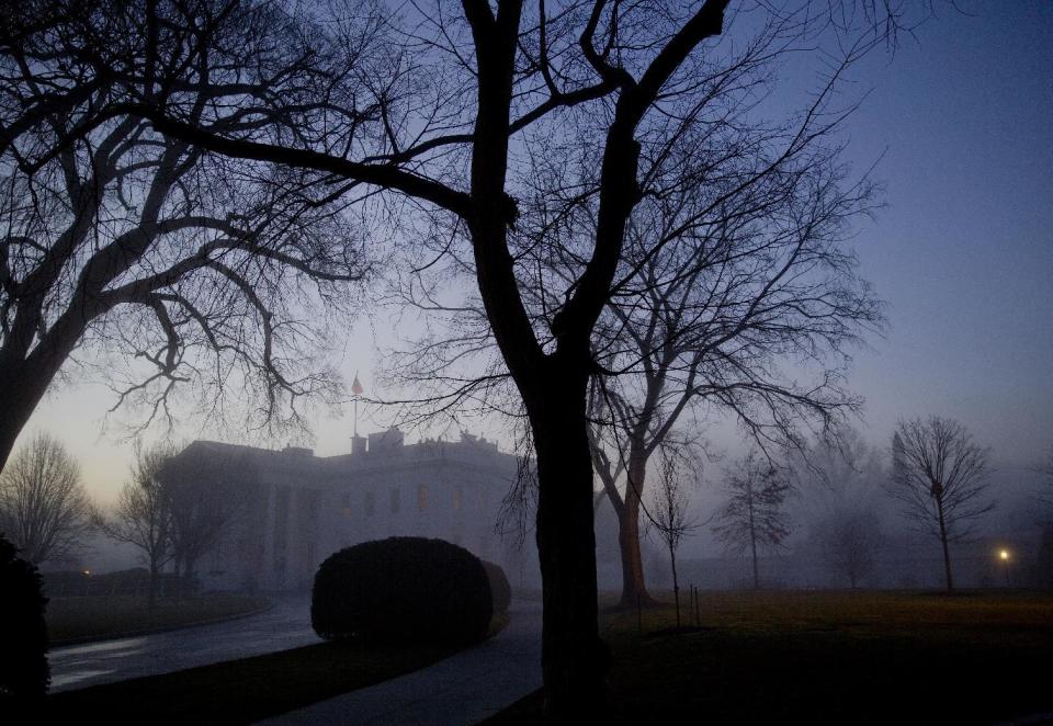 Morning fog is seen at the White House in Washington, Wednesday, Jan. 18, 2017. President Barack Obama is in the final days of his presidency with an 11th hour push to tie up loose ends and put the finishing touches on his legacy before handing the reins to President-elect Donald Trump. (AP Photo/Pablo Martinez Monsivais)