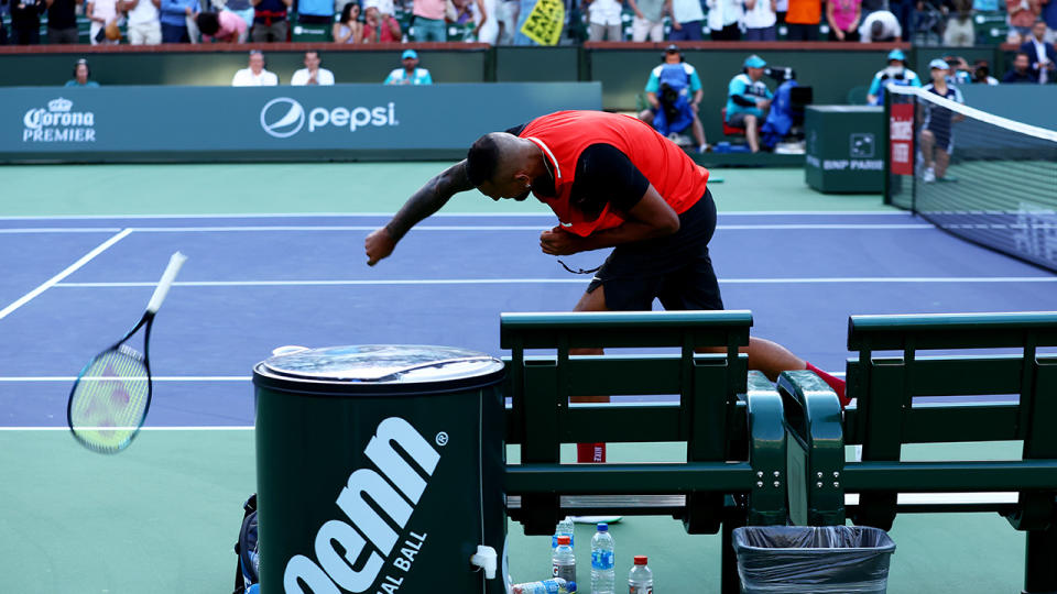 Nick Kyrgios hurls his racquet after losing to Rafael Nadal at Indian Wells. (Photo by Clive Brunskill/Getty Images)