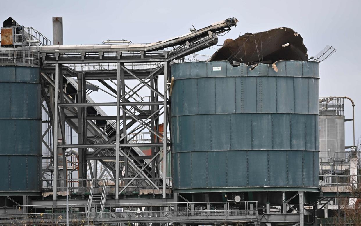  A picture shows a damaged silo at a waste water treatment plant in Avonmouth, near Bristol in southwest England on December 4, 2020 after an explosion the previous day - BEN STANSALL/AFP