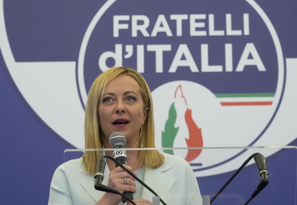 FILE - Far-Right party Brothers of Italy's leader Giorgia Meloni speaks to the media at her party's electoral headquarters in Rome, early Monday, Sept. 26, 2022. Far-right Brothers of Italy party controversially retains the symbol of a flame used by the fascist regime. Italy's failure to come to terms with its fascist past is more evident as it marks the 100th anniversary, Friday, Oct. 28, 2022, of the March on Rome that brought totalitarian dictator Benito Mussolini to power as the first postwar government led by a neo-fascist party takes office. (AP Photo/Gregorio Borgia, File)