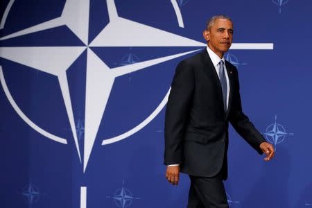 U.S. President Barack Obama begins a news conference after participating in the NATO Summit in Warsaw, Poland July 9, 2016. REUTERS/Jonathan Ernst