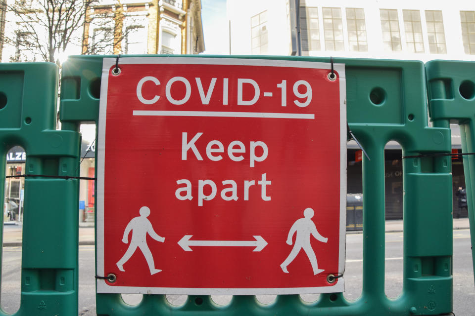  'COVID-19 Keep Apart' sign on Oxford Street, London.
Most businesses remain shut in the UK as the nation continues to battle with the coronavirus pandemic. (Photo by Vuk Valcic / SOPA Images/Sipa USA) 