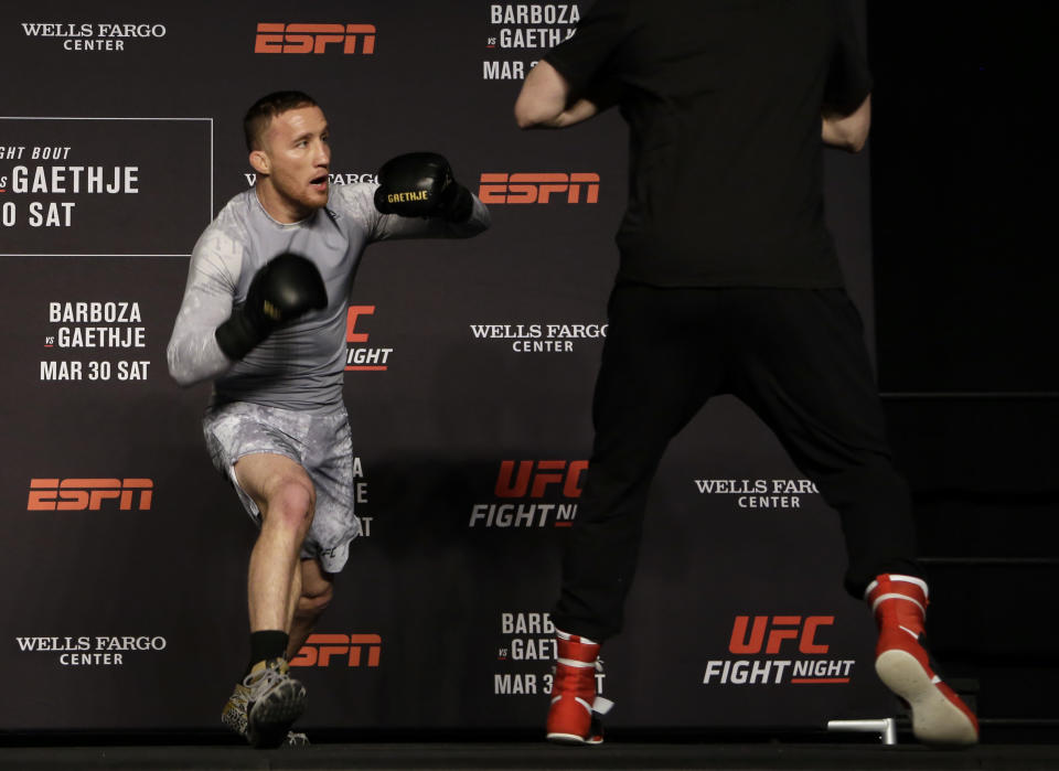 In this Wednesday March 27, 2019, photo, UFC fighter Justin Gaethje works out in front of fans in Philadelphia. Gaethje fights Edson Barboza in a lightweight bout in the main event of the UFC card in Philadelphia on March 30. The bout features two of the most ferocious kickers in the sport, who are both coming off wins following two straight losses. Gaethje viewed the fight as an elimination bout of sorts for each fighter to stay in the hunt for a championship match against Khabib Nurmagomedov. (AP Photo/Jacqueline Larma)