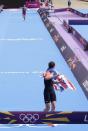 Britain's Alistair Brownlee looks back on finish line at Spain's Javier Gomez in the men's triathlon final during the London 2012 Olympic Games at Hyde Park August 7, 2012. REUTERS/Tim Wimborne (BRITAIN - Tags: OLYMPICS SPORT TRIATHLON TPX IMAGES OF THE DAY) 