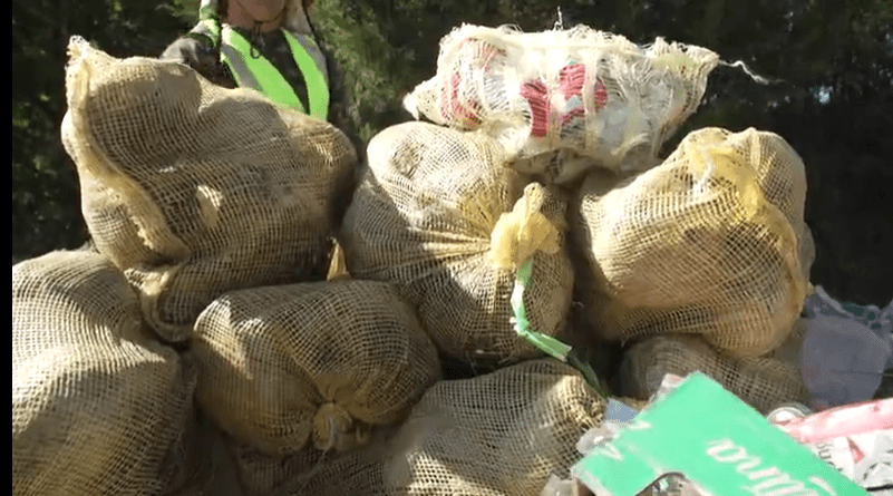 Included in the trash collected, bags of coconuts (KXAN Photo/Mike Rush)