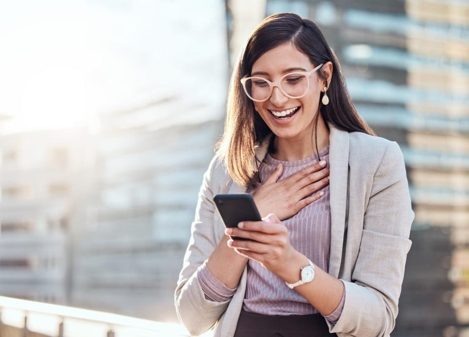 An investor holding a mobile phone looked surprised.