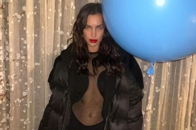 Irina Shayk Wears Sheer Top for Snowy Skating Outing with Friends to  Celebrate Her Birthday