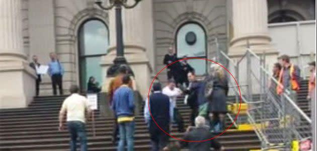 Rogue MP Geoff Shaw clashes with protesters outside Parliament House. Photo: 7News