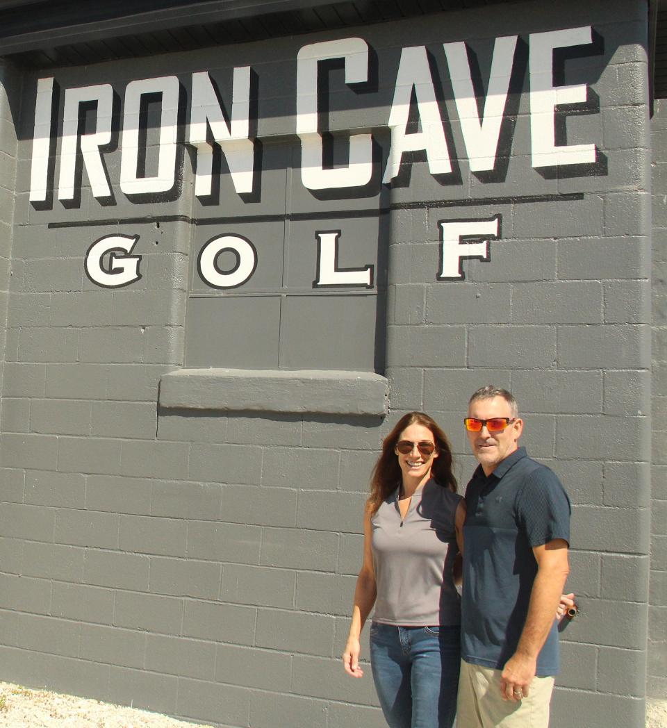 Bobbi and Brian Ludwig stand outside the Iron Cave Golf facility at OB's Cervezaria in Chenoa. The Ludwigs have a second such place in South Wilmington and are hoping to open a third in Watseka in 2024.